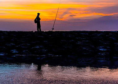 fisherman during sunset