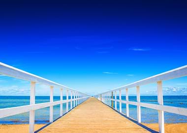 Wooden ocean dock in summer vacation resort