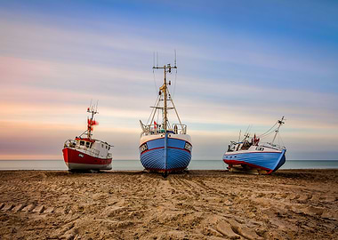 Fishing boats in sunset