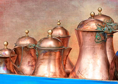 old copper pitcher on text