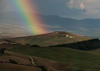 Rainbow over Toscany field