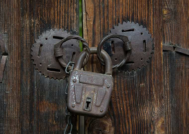 An old door and padlock