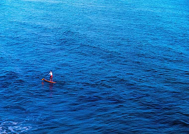surfing with blue ocean