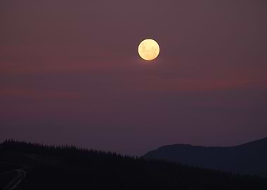 Moon over mountains
