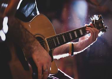 Musician plays guitar