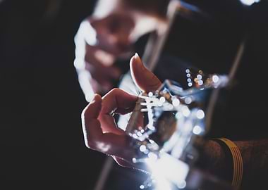 Musician plays guitar