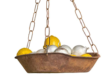 lemon and onion on scale