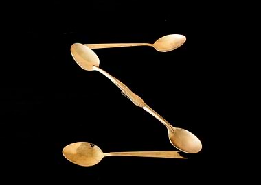 Letter S made of spoons