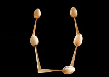 Letter U made of spoons