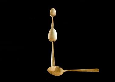 Letter L made of spoons