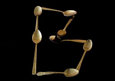 Letter B made of spoons