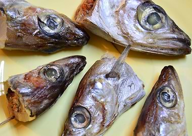 Herring heads on a plate