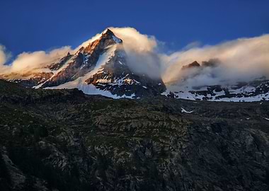 Clouds over Alps mountains
