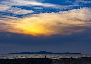 Orange sun in the clouds