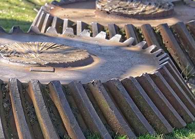 Rusty gears on the ground