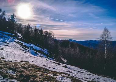 Snowy mountain in the sun