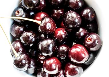 Sweet wild cherries in a b