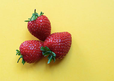 Yellow and strawberries