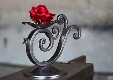 Black metal and red rose