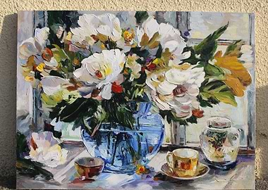 Flowers in a vase in the m