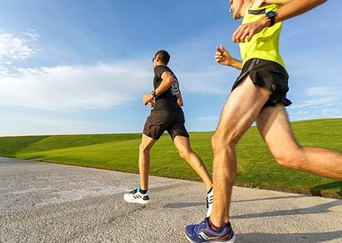 Two Men Running in Park