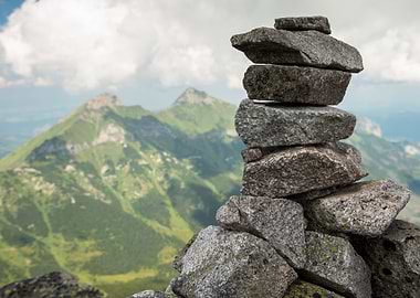 Stack Of Rocks Cloudy Moun