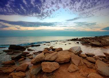 Sunset Over Rocky Coast