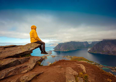 Male Tourist Sitting On Th