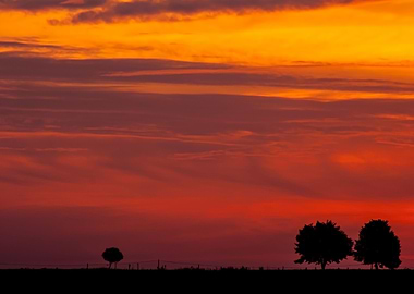 Sunset Over Rural Field