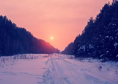 Sunrise Over Snowy Road In