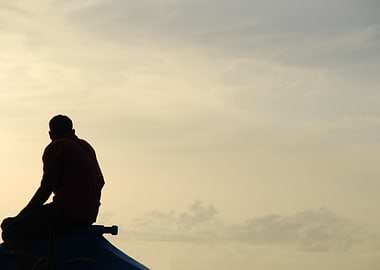Silhouette Of A Fisherman