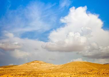 Desert With Cloudy Sky In