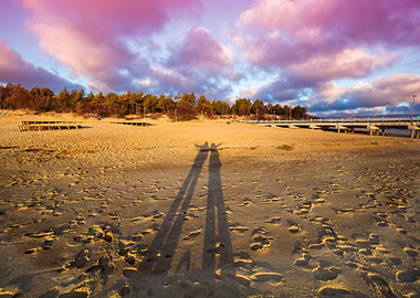 Long Shadows Of Man And Wo