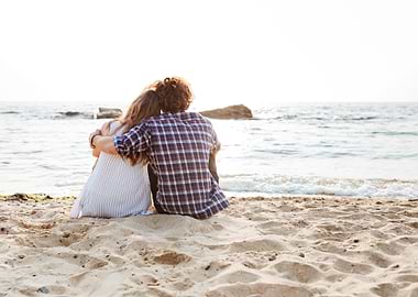 Back View Of Couple Sittin