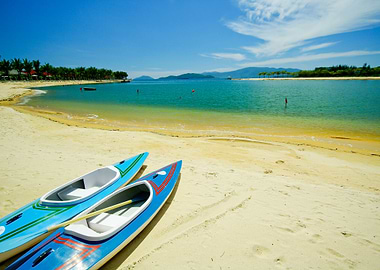 Paddle Boats On White Sand