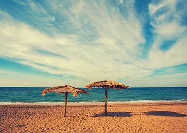 Two Straw Beach Umbrellas