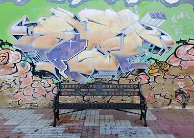 Bench and Grafitti wall