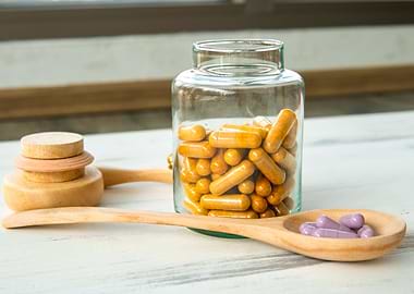 Supplement in glass bottle