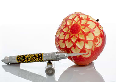 carved red apple