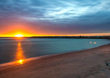Sunrise at the sandy coast