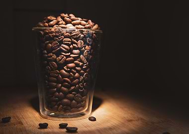 Coffee beans in glass cup