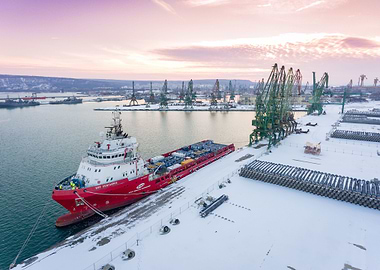 Ship at snowy Varna port