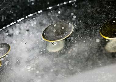 Oil bubbles on water macro