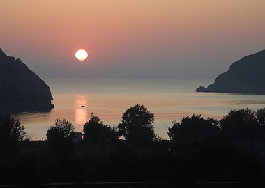 SUNSET IN PORTOKOUFO