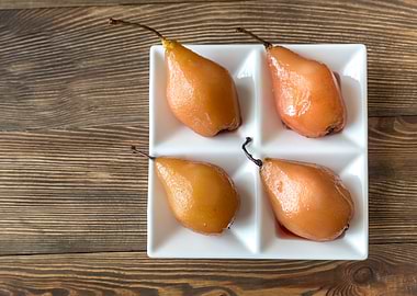 Poached pears on the plate