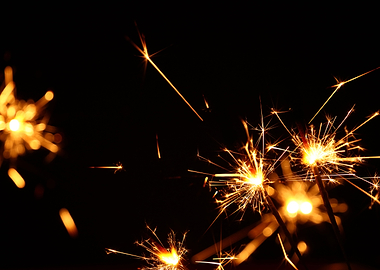 Sparklers over black