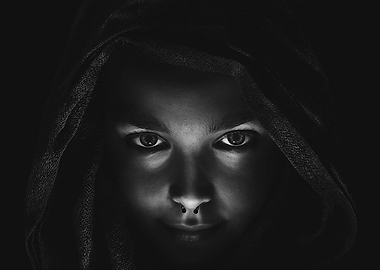 Woman magician with hood