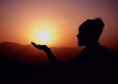 Woman holding sunlight