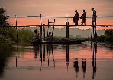Three monks on a bridge