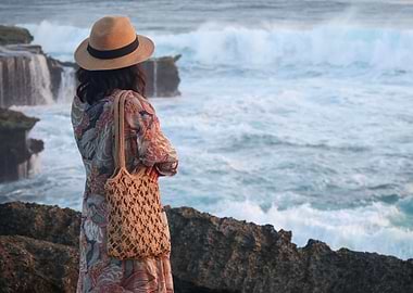 Woman looking at the ocean